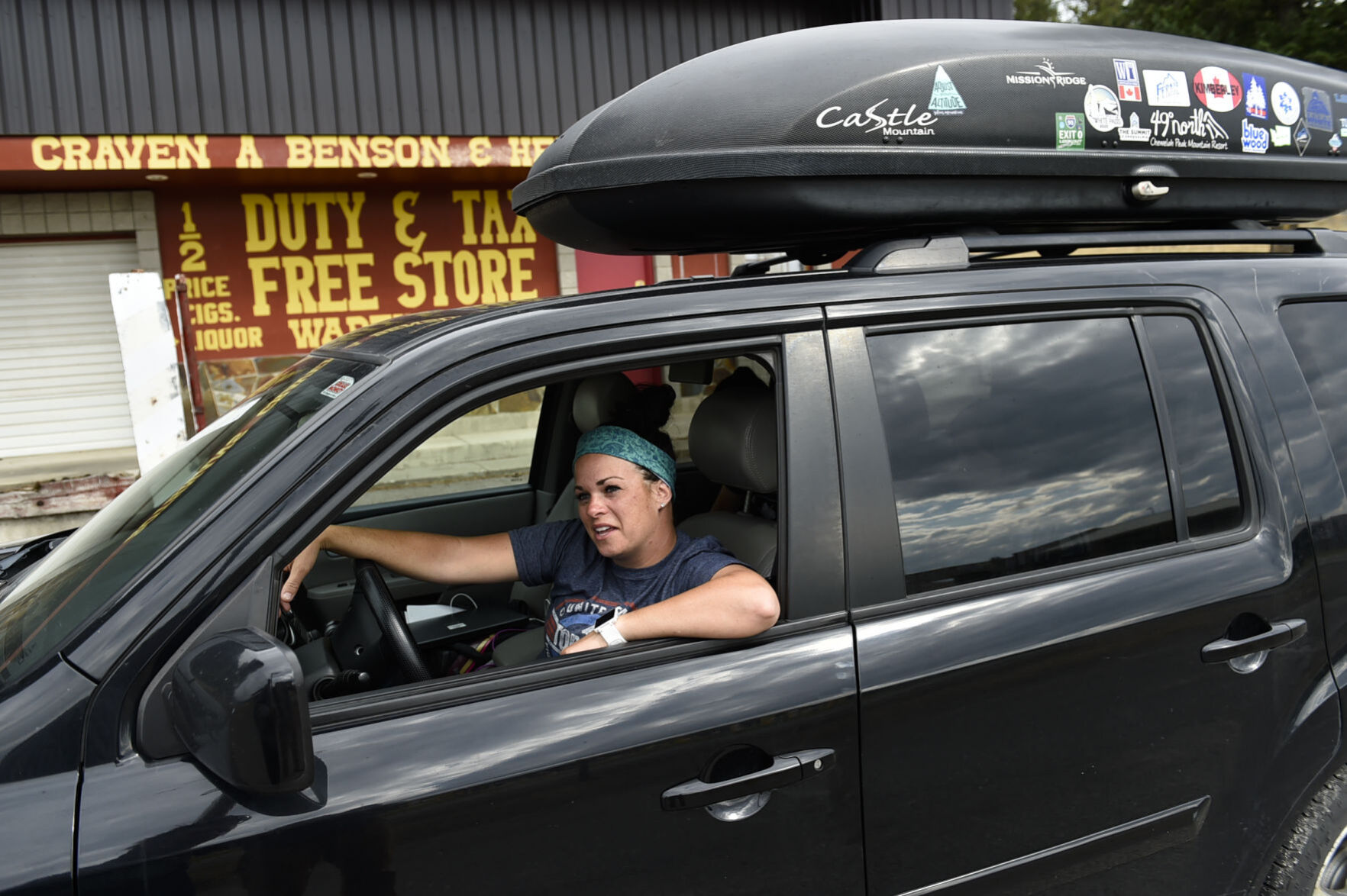 Andrea Whitemarsh and her three children sit in their car
